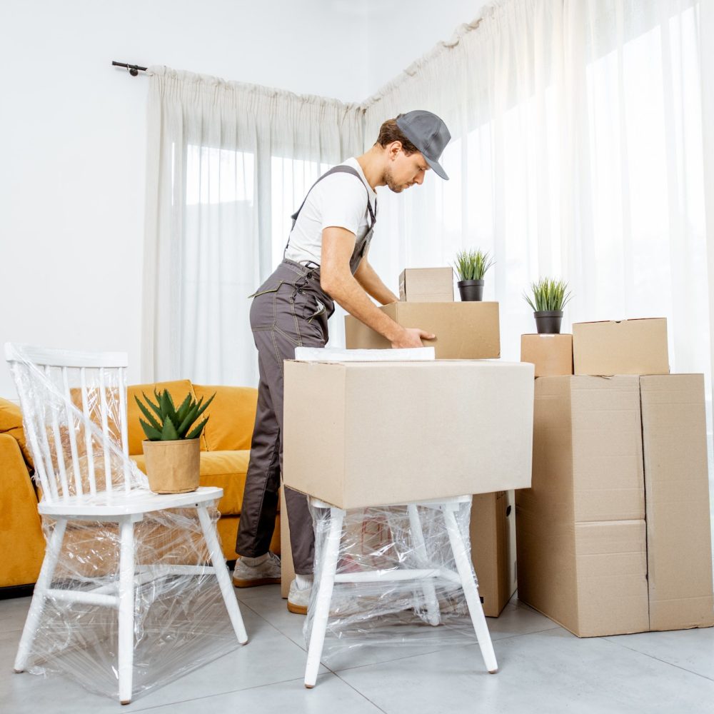 professional-mover-delivering-furniture-to-a-new-house-1.jpg